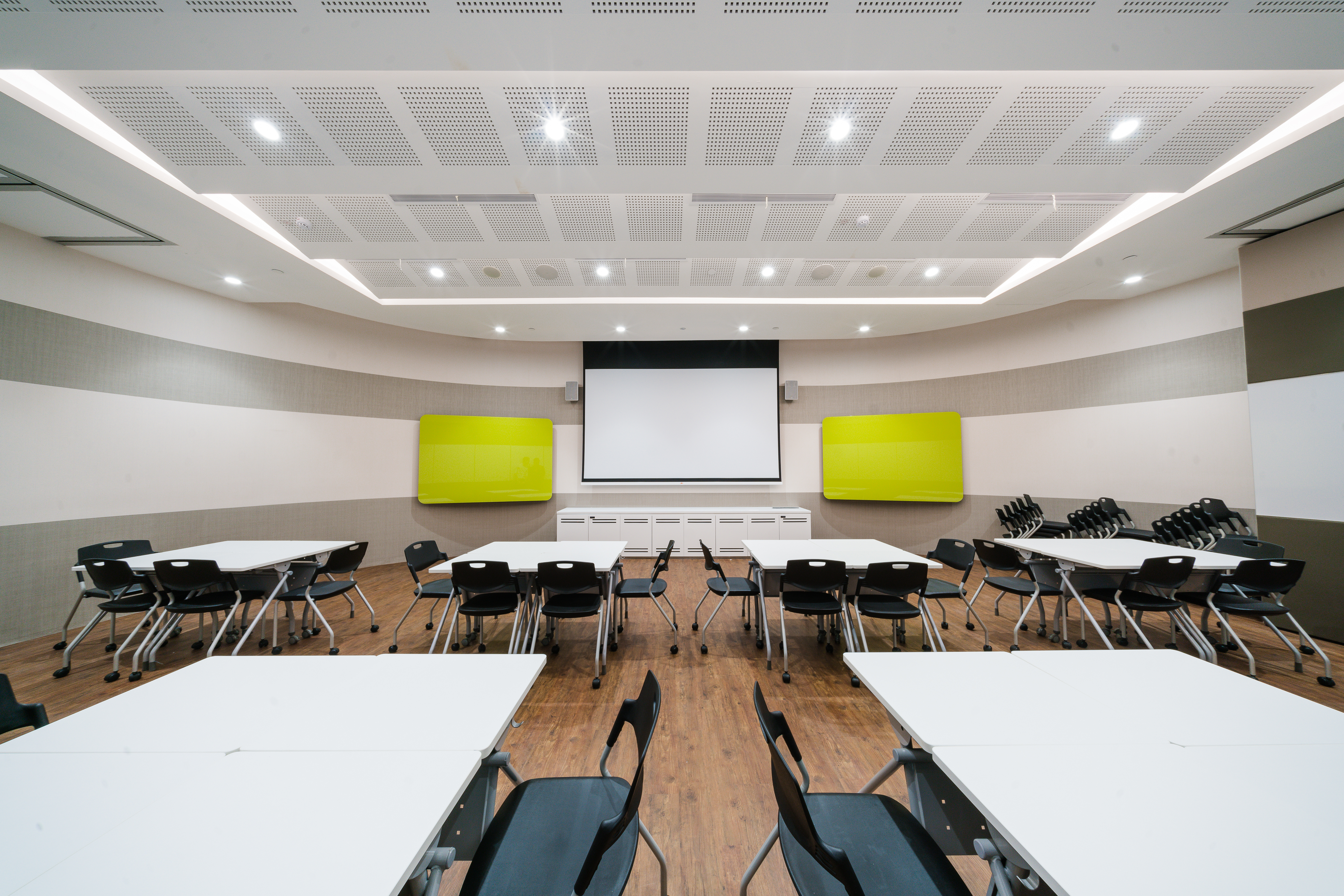 Level 9 - 1 training room at LLSG Training Venue Singapore with modern layout and access to an air-conditioned breakout area