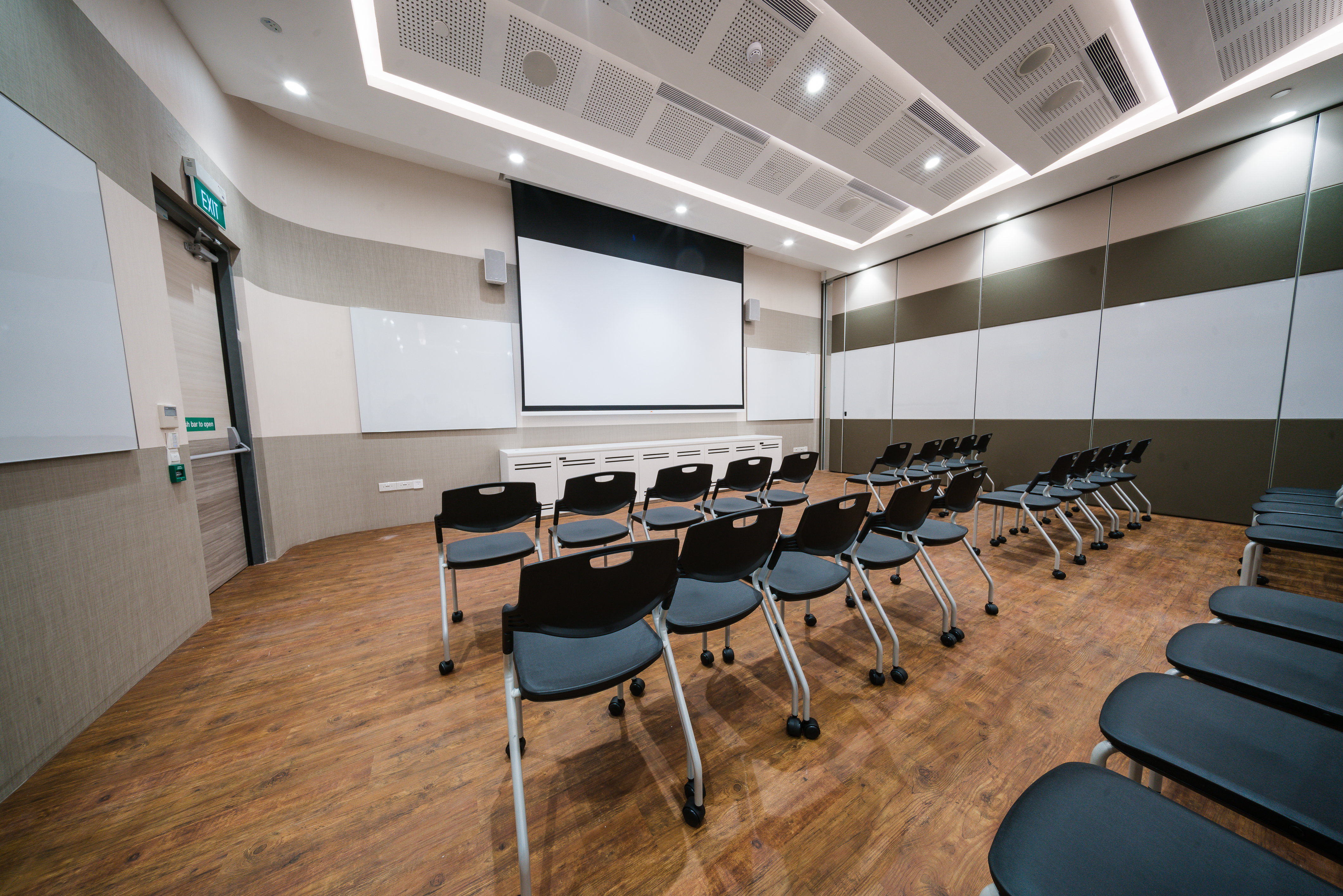 Compact Level 9 - 3 training room at LLSG Training Venue Singapore featuring a modern setup and landscaped common area